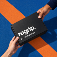 Hands holding the Regrip DIY Gripping Kit box against a blue and orange background